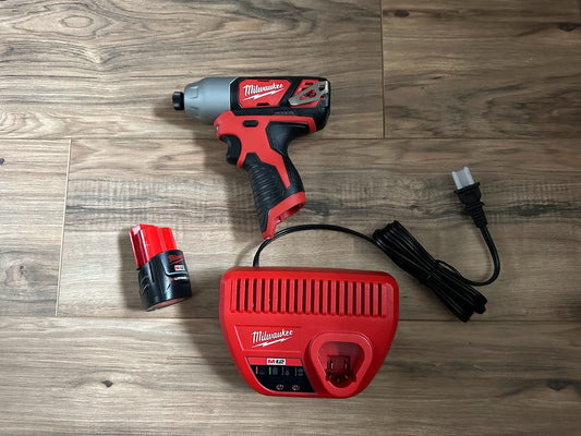 Brand New Milwaukee M12 1/4" Impact Kit (Includes battery and charger)